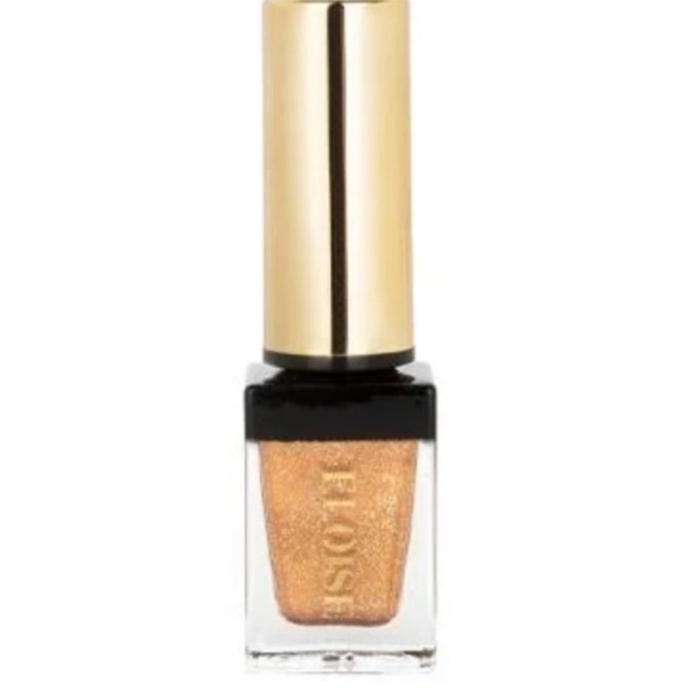 Eloise metallic foiled liquid eye shadow in Pure Gold